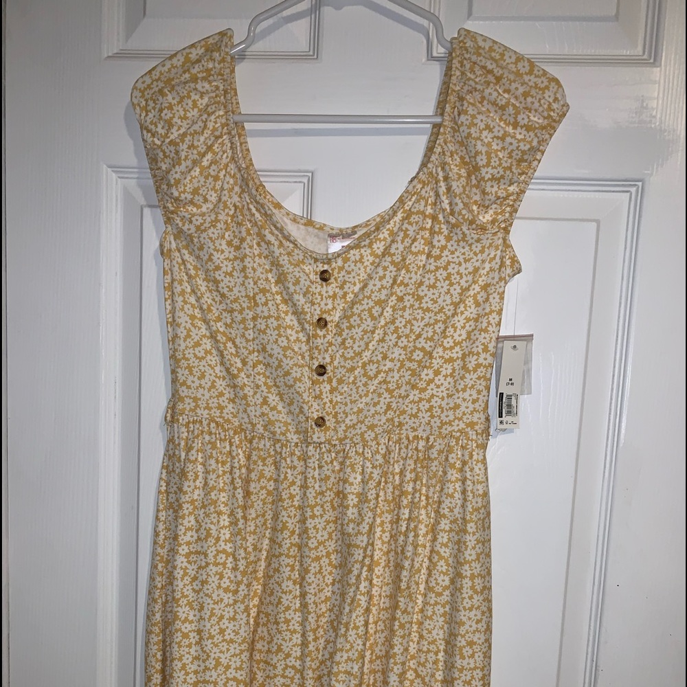 white and yellow floral dress